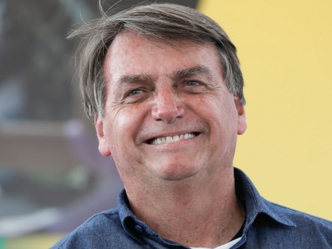 Presidente Jair Bolsonaro rindo